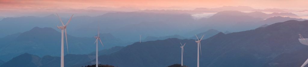 wind turbines at sunset